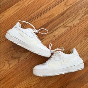 Nike women’s AF1 Air Force 1 platform sneakers in white